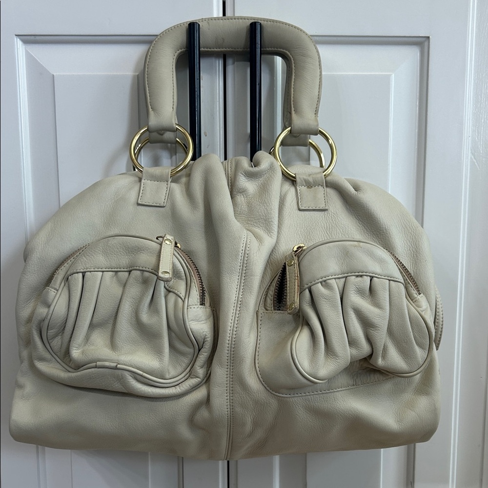 BULGA Cream Travel Bag with Gold Accents